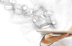 Restauration digitale: un modèle à suivre Un chef cuisinier tennat une tablette